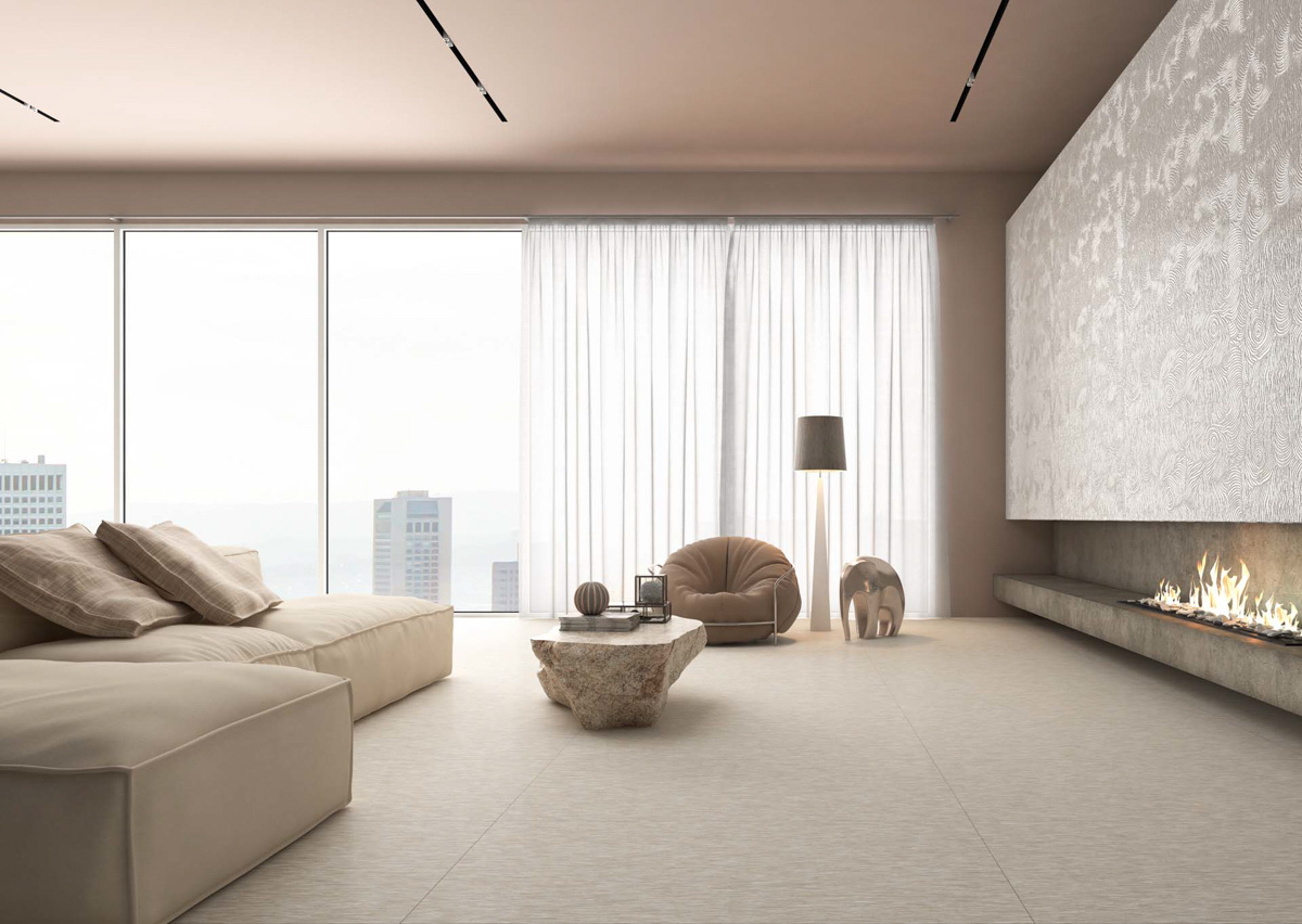 Amplio salón en tono beige con pavimento y revestimiento de Apavisa