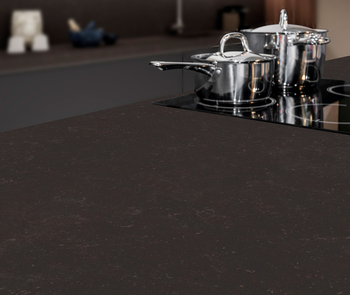 elegant black kitchen with porcelain worktop